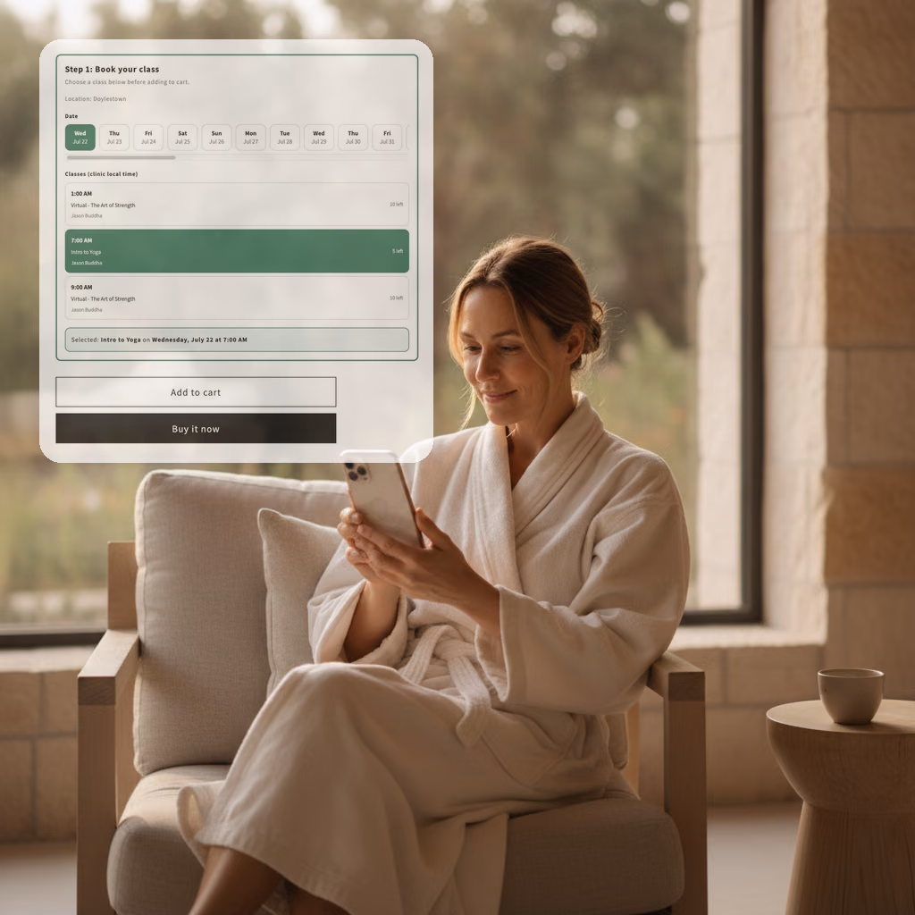 A woman in a spa robe choosing an appointment time on her phone against live availability in warm morning light.